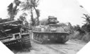 Image : Au sud de Bayeux, char Sherman Britannique de la 50ème Division d'Infanterie devant un <em>Panzer</em> détruit