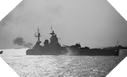 Image : L'HMS Rodney ouvre le feu sur les positions allemandes du secteur de Sword Beach le 6 juin 1944