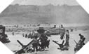 Image : Devant le point fortifié du Ruquet, les Américains, aidés par des chars D.D., progressent