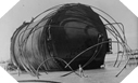 Image : Un "conus" laissé à l'abandon sur une plage de Grande-Bretagne après la guerre