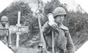 Image : Soldats américains prenant position au sud de la-Haye-du-Puits après la capture de la ville