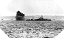 Image : L'USS Arkansas bombardant la batterie de Longues-sur-Mer le 6 juin 1944