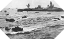 Image : Les LCVP font route vers les plages de débarquement devant l'USS Augusta le 6 juin 1944