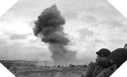 Image : Un obus tiré par un canon de 88 explose sur la plage de Utah Beach lors du débarquement