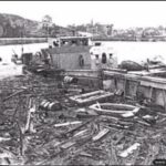 Photos of Port-en-Bessin in 1944 14 Une canonnière antiaérienne allemande détruite dans le port de Port-en-Bessin. Photo : US National Archives