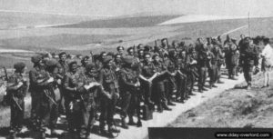 Débarquement d'un détachement belge de la Brigade Piron à Arromanches en août 1944.