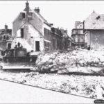 Photos of Port-en-Bessin in 1944 27 Opération de déblaiement des constructions allemandes détruites à Port-en-Bessin. Photo : IWM