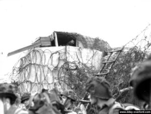 Ralliement pour ces soldats du régiment de La Chaudière au pied du Wn 28 à La Cassine. Photo : Archives Canada