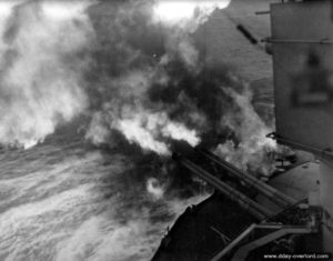 USS Nevada's 356 mm guns open fire on the Utah Beach area. Photo: US National Archives