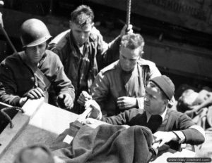 Transshipment of wounded and bodies of soldiers killed across the Channel to reach England. Photo: US National Archives