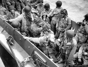 Glider pilots are re-embarked aboard an LCVP landing craft after D-Day to reach England. Photo: US National Archives