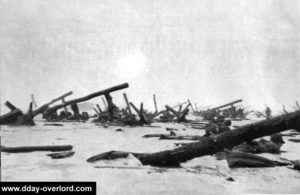 Cliché du photographe de guerre Robert Capa sur Omaha Beach le 6 juin 1944 à l'ouest du point d'appui allemand codé Wn 62 vers 07h15. Photo : US National Archives