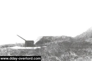 Canon antichar allemand de 50 mm sur le point d'appui Wn 61 à Omaha Beach. Photo : US National Archives