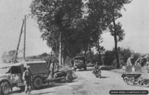 Des éléments de la 1ère brigade belge – Brigade Piron – s’apprêtent à traverser la Touques dans le secteur de Villers-sur-Mer. Photo : IWM