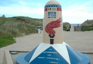 Position initiale de la "Borne 00" de la 3rd (US) Army à Utah Beach. Ce monument a été déplacé de trois cent mètres. Photo : D-Day Overlord