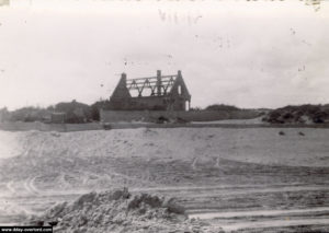 La "Maison Rouge", détruite après les combats. Photo : US National Archives