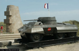 Véhicule M8 de la 2e DB française à Saint-Martin-de-Varreville à Utah Beach. Photo : D-Day Overlord