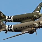 Gathering Douglas C-47 aircraft in Normandy on the occasion of the 75th anniversary of the landing in 2019. Photo : Daks over Normandy