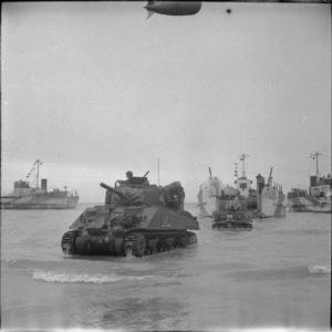 Sherman tanks belonging to the 50th (Northumbrian) British Infantry Division land on May 6, 1944 on Hayling Island in Hampshire as part of Exercise Fabius. Photo: IWM H 38270